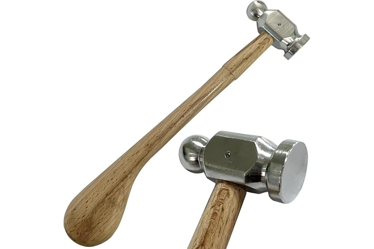 Chasing hammers on white background